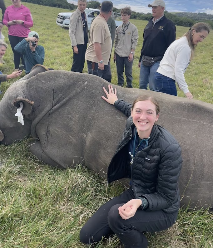 Nicole touching a rhino.