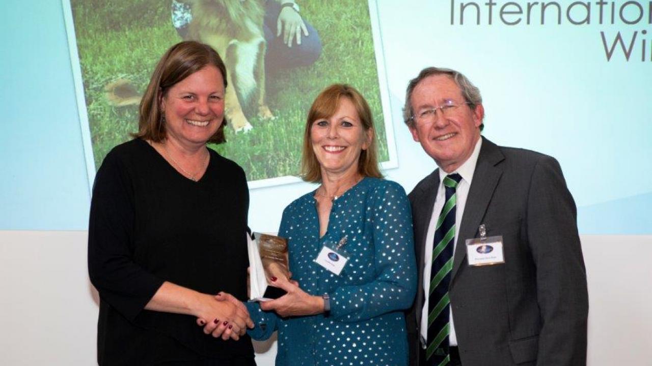 Dr. Danika Bannasch (left) receives the International Canine Health Award. Dr. Bannasch (left) receives the International Canine Health Award.