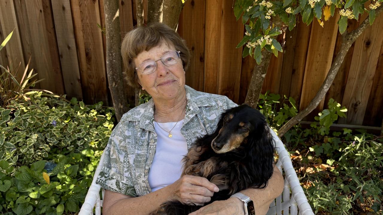 Dr. Harriet Benson and her beloved canine companion Buster