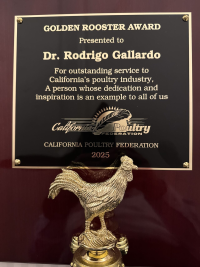 plaque with rooster trophy honoring the Golden Rooster Award