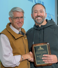 Dr. Bill Culp receiving 2024 Faculty award.