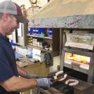 UC Davis farrier Shane Westman molding horseshoes