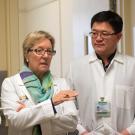 two medical professionals in white lab coats